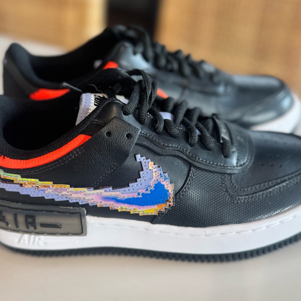 Nike Black Sneakers with Iridescent Pixel Swoosh and Blue Detail
